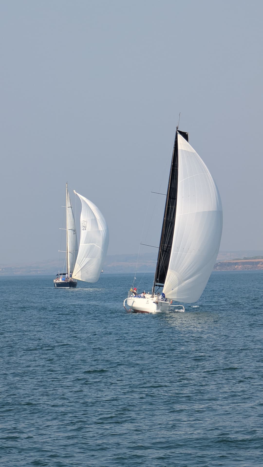 Two Ocean Gold yachts running under spinnaker off the Konkan coast during Season I